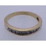 10CT GOLD & DIAMOND SET HALF ETERNITY RING, size Mid M-N, stamped 10K and 1/4 TW, having eleven