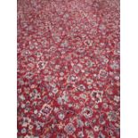 ENGLISH PATTERN STYLE WOOLLEN CARPET, red ground with extensive all over floral pattern repeated