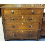 CIRCA 1840 ANGLESEY OAK CHEST of two short over three long drawers, pine lined with inlay detail and