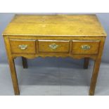 ANTIQUE OAK THREE DRAWER SIDE TABLE, rectangular top over three oak lined drawers having fancy brass