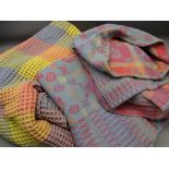 TWO WELSH WOOLEN BLANKETS, one on pink and blue tonal grounds with traditional reversible pattern,
