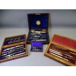 FOUR CASED DRAWING INSTRUMENT SETS including a Rosewood cased set with presentation plaque E W