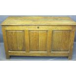 CIRCA 1820 PANELLED OAK COFFER, the top with iron strap hinges opening to reveal an interior