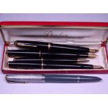 PARKER - Vintage (1950s) collection of a Black Parker Duofold fountain pens and pencil comprising: 1