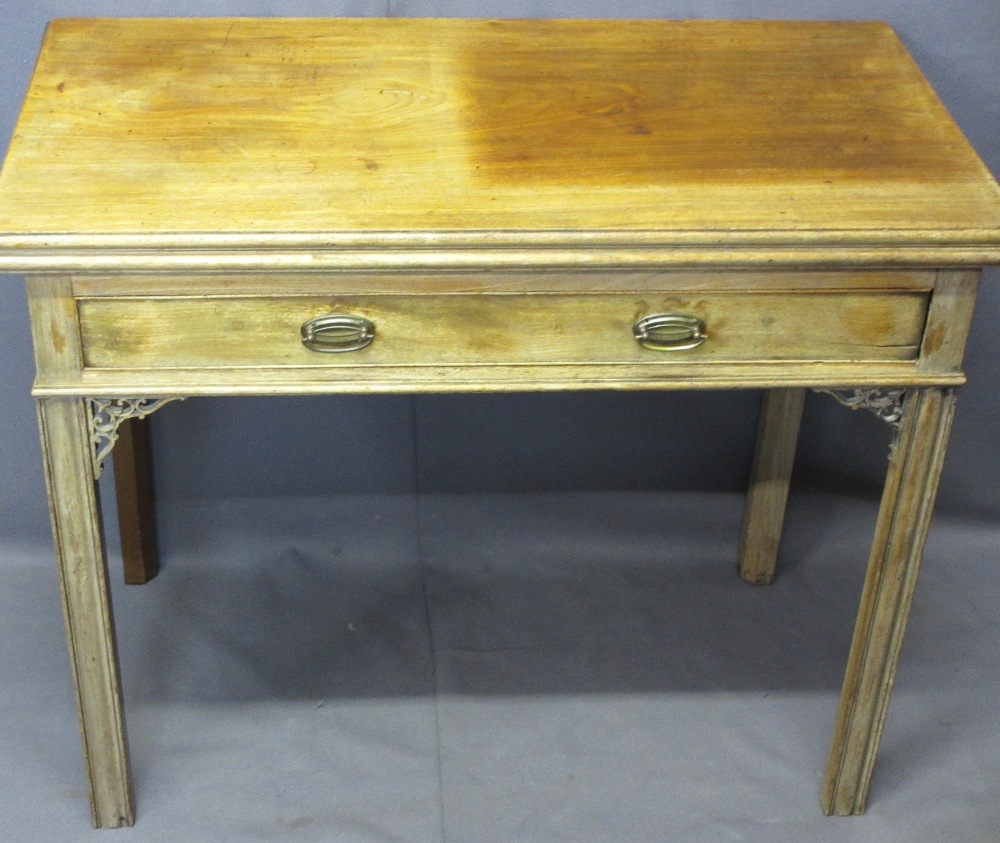 REGENCY MAHOGANY FOLD-OVER TEA TABLE having a single frieze drawer and pierced corner decoration