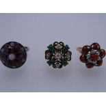 THREE DRESS RINGS - 1.a nine carat gold with floral seven coral and six pearl setting, 4.5 grms,