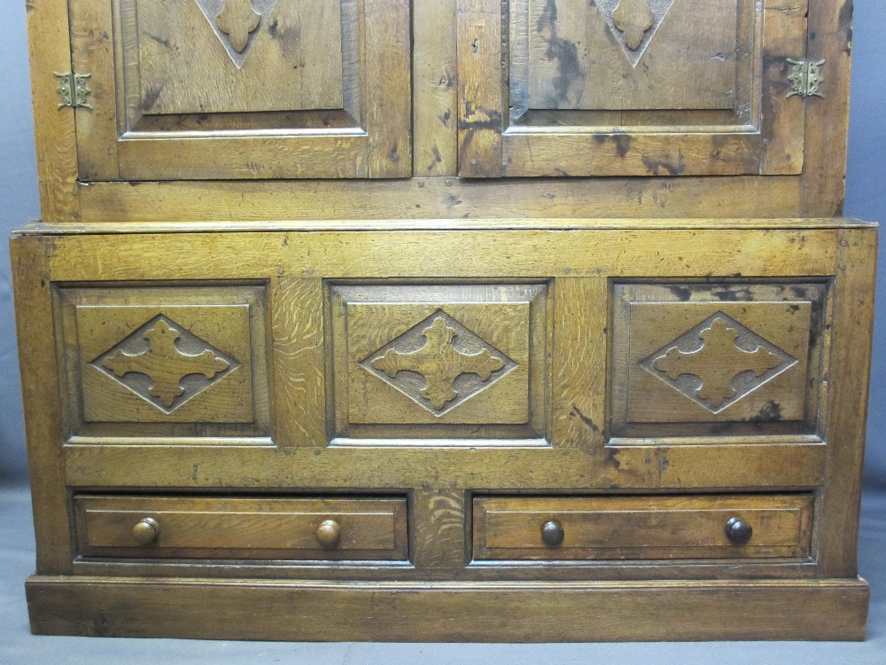 CIRCA 1800 CARVED OAK PRESS CUPBOARD with fan detail and Gothic type crosses on shaped and chamfered - Image 3 of 7