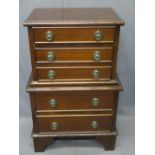 REPRODUCTION MAHOGANY MINI CHEST ON CHEST on corner bracket feet, 67cms H, 43cms max W, 28.5cms