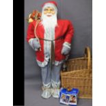 LARGE STANDING FATHER CHRISTMAS MODEL, wicker basket, boxed Polaroid instant camera and a vintage