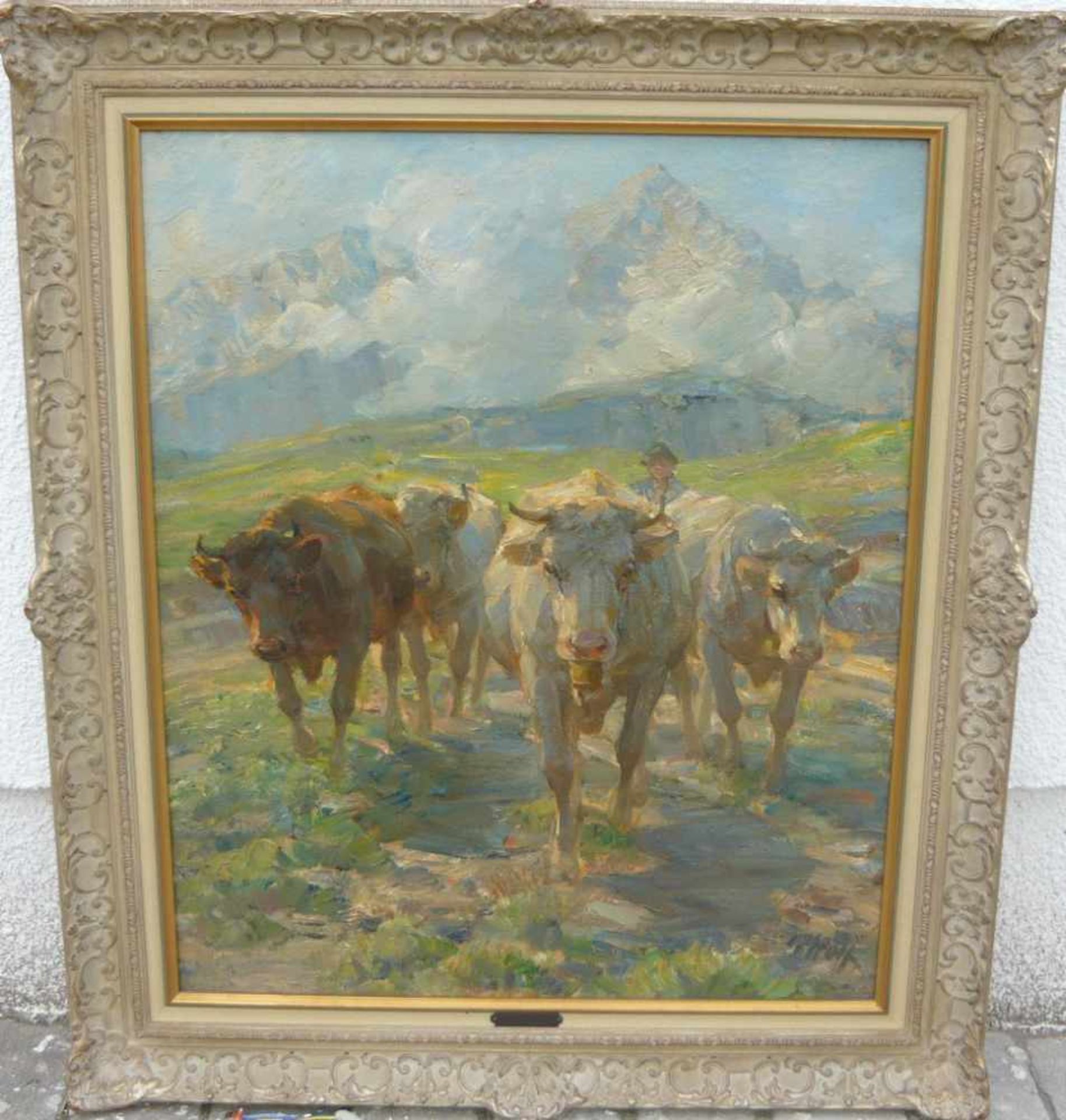 Georg Wolff. Kühe und Hirte vor Alpenkulisse. Öl/Lw. Sig.u.r. Rahmen ca. 74x64cm.- - -22.00 %