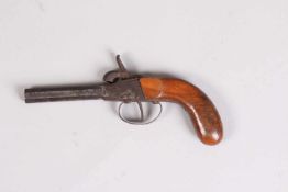 Kleine Perkusionspistole.19. Jh. Buchenholzgriff, achtkantiger Lauf. Rostig. L: 20,5 cm.