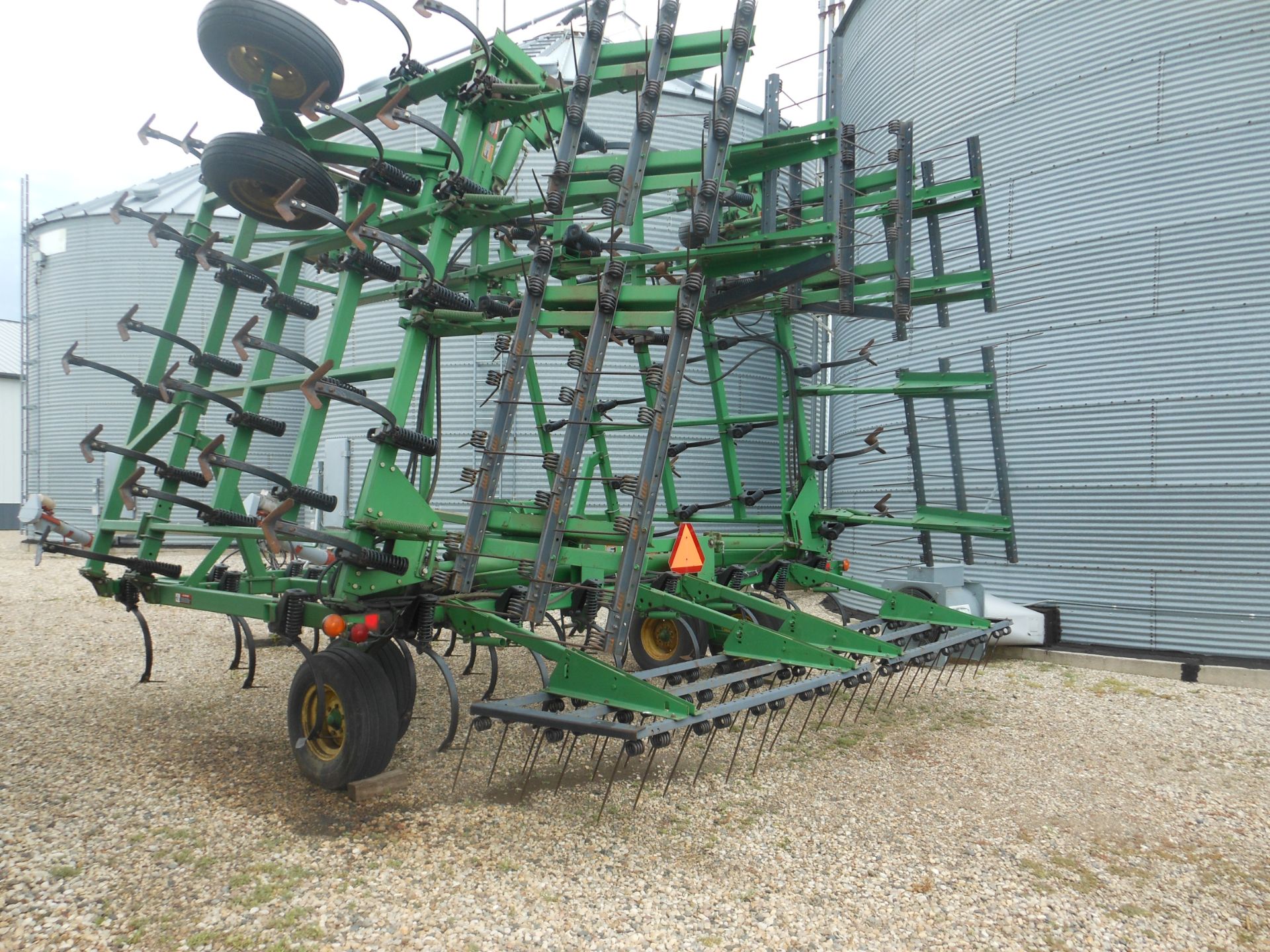 44 ½ 980 JD field cultivator, tine 3 bar leveler.