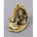 19th century Japanese school. Carved bone netsuke depicting a dignitary signed Ikkosai