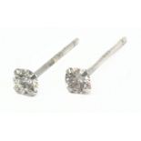A pair of stud earrings with an 18 k. white gold setting and brilliant cut diamonds