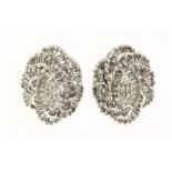 A pair of diamond stud earrings