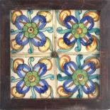 An 18th century wallplaque with four Valentian showing tiles
