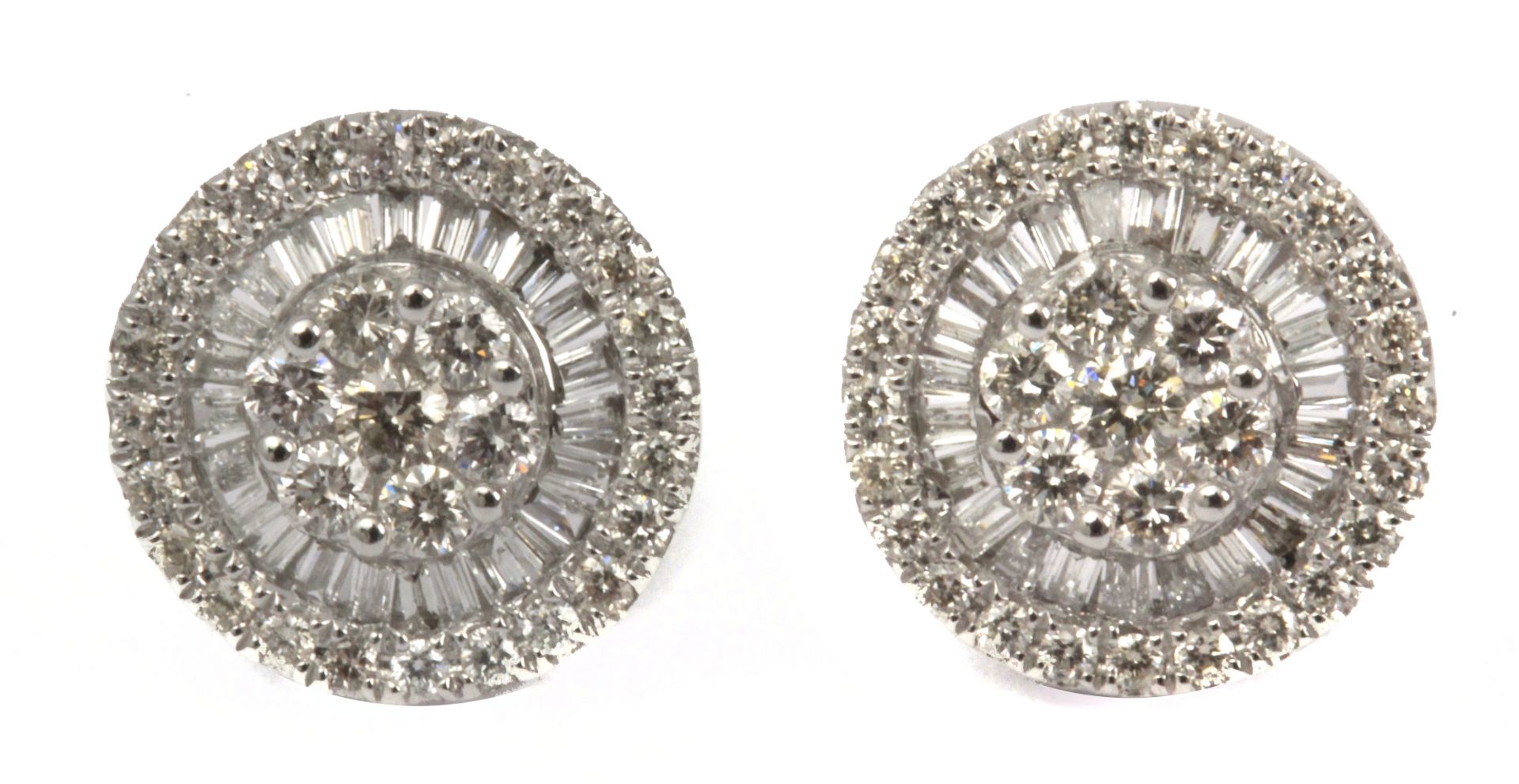 A pair of diamond cluster earrings with an 18 k. white gold setting