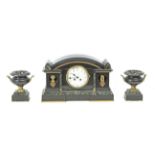 A late 19th century Napoleon III marble mantel clock garnished with two urns