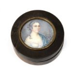 A 19th century snuff box in carved olive tree with a dame portrait miniature on the cover