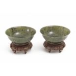 A pair of Chinese bowls in carved nephrite, late 19th century-early 20th century