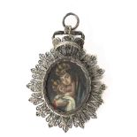 An 18th century Spanish reliquary pendant in silver filigree