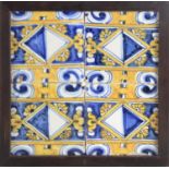 A 17th century wallplaque with four Catalan showing tiles