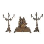 A 20th century Empire style bronze mantel clock