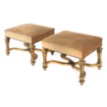 A pair of 20th century Louis XVI style benches in carved and gilt wood