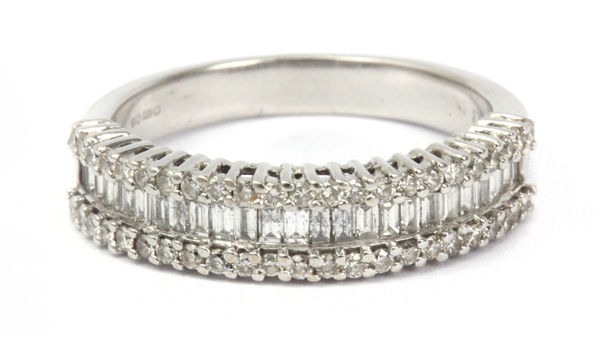 A half eternity diamond ring with an 18k