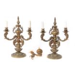 A pair of 20th century three light gilt bronze candelabras