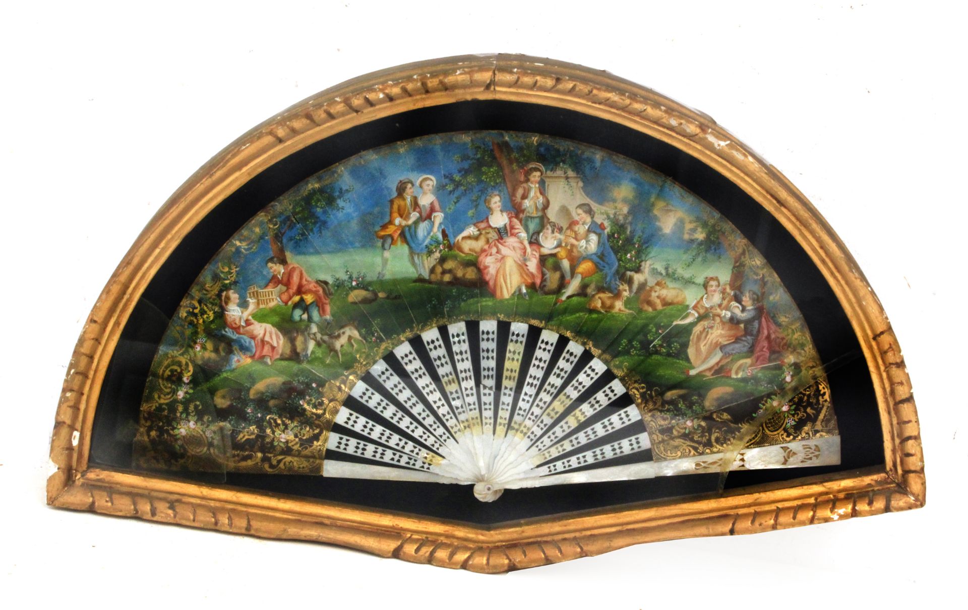 A 19th century Isabelino fan in carved mother of pearl