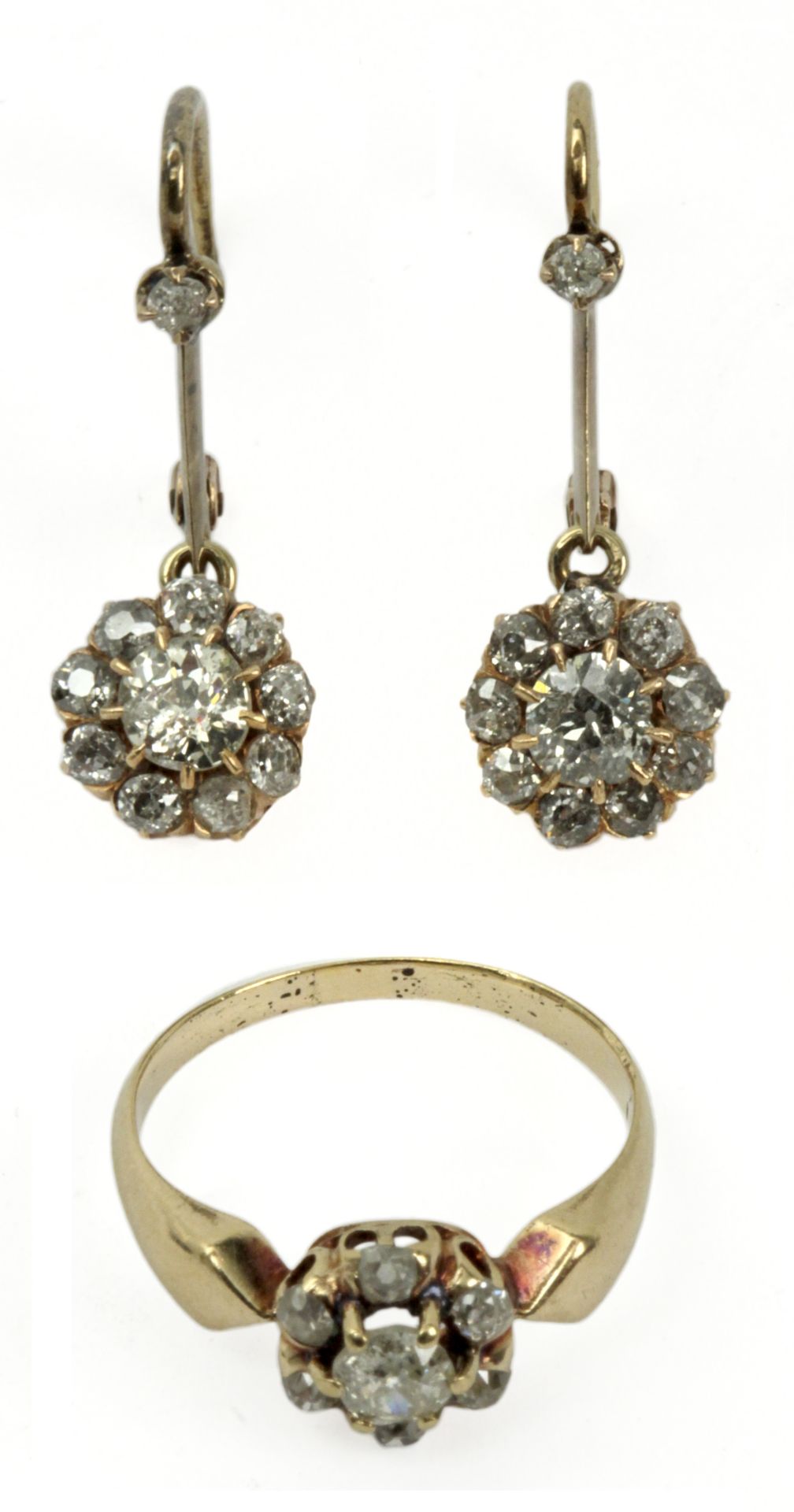 A late 19th century set of diamond cluster ring and earrings