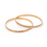 A pair of yellow gold bangles circa 1930