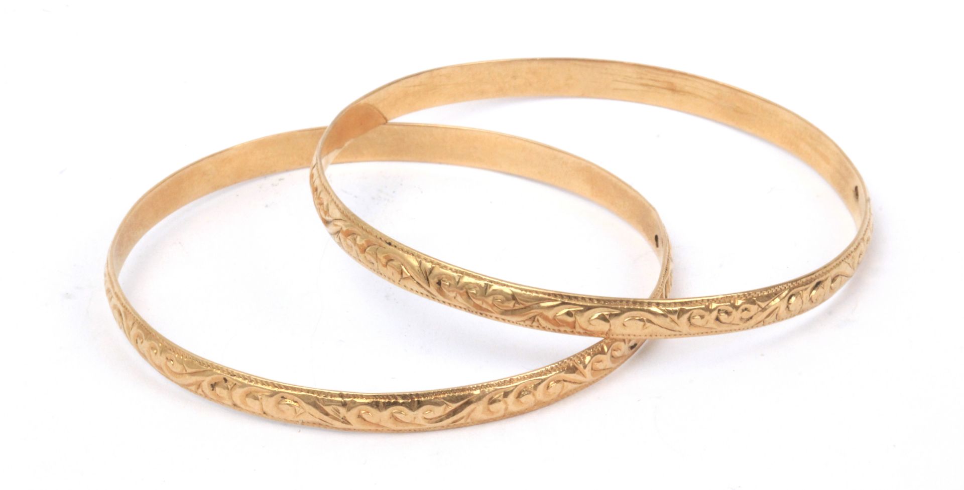 A pair of yellow gold bangles circa 1930