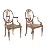 A pair of 19th century mahogany ship's armchairs