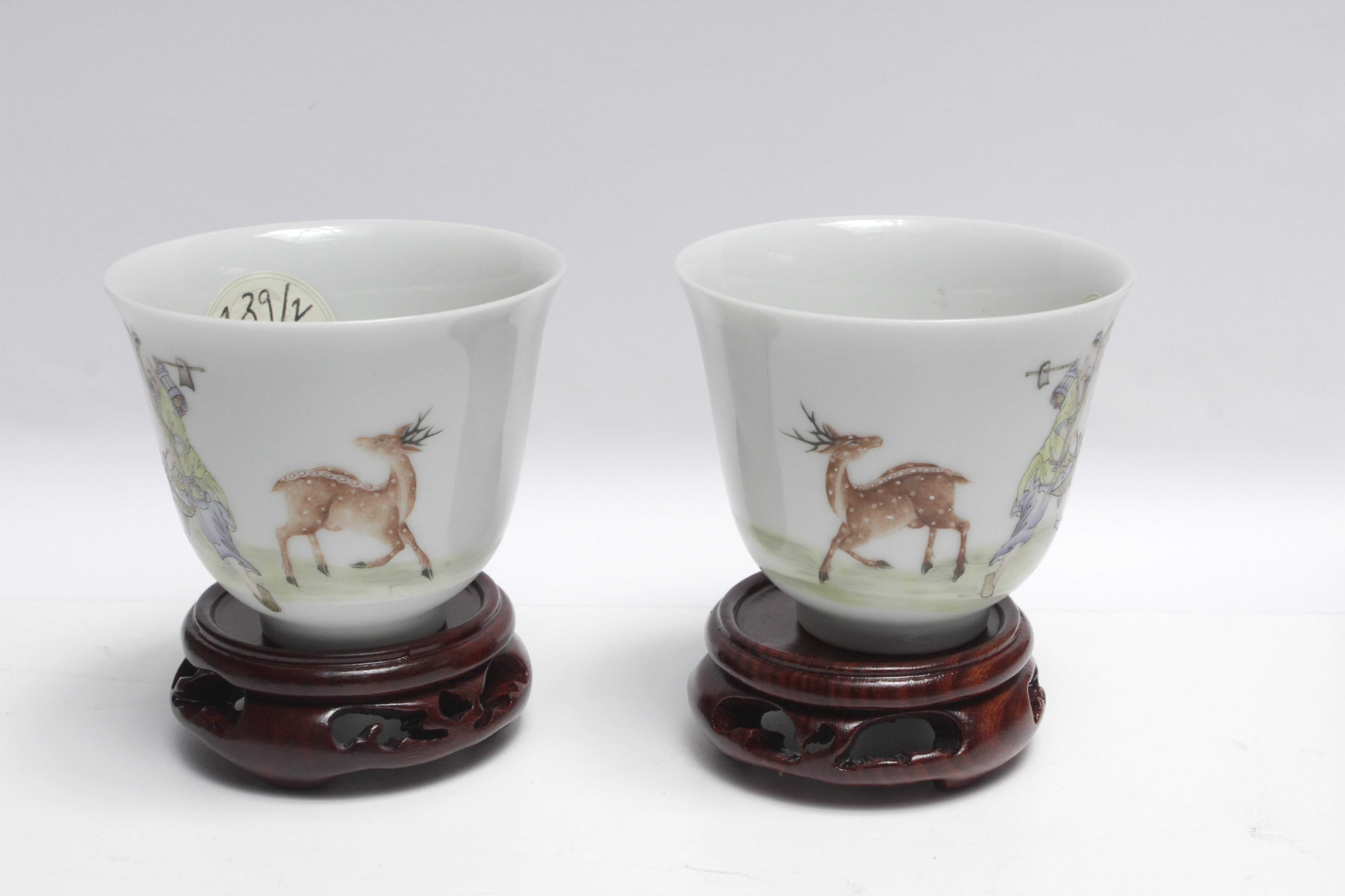 A pair of 19th century Chinese cups in glazed porcelain. Guangxu period and mark