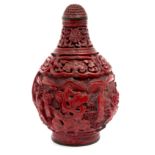 An 18th century Chinese bottle in cinnabar lacquer