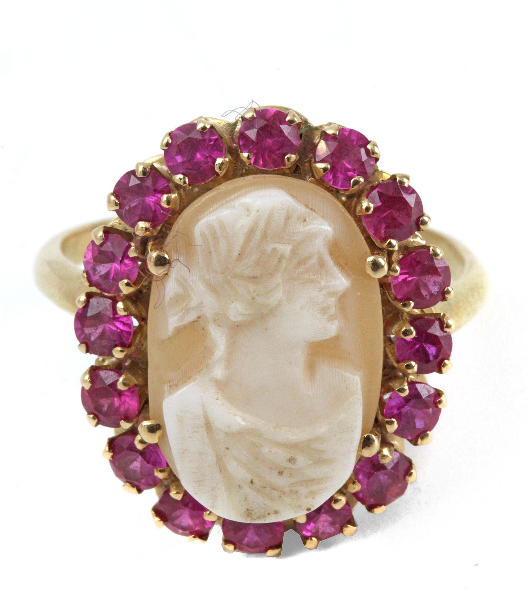 A mid 20th century ring with an 18k. yellow gold setting and a cameo