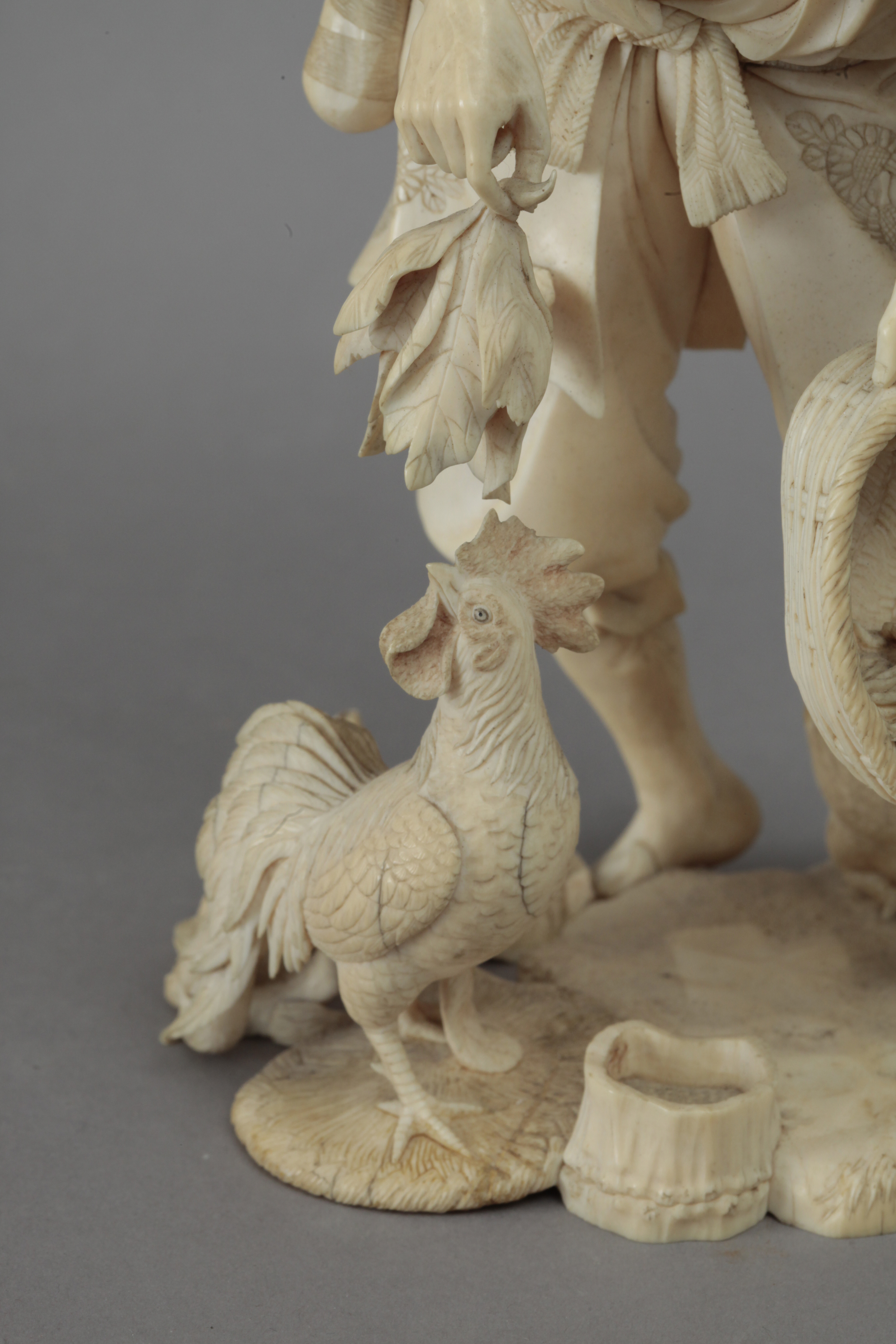 Late 19th century Japanese school. A carved ivory okimono depicting a farmer feeding birds. Signed - Image 6 of 8