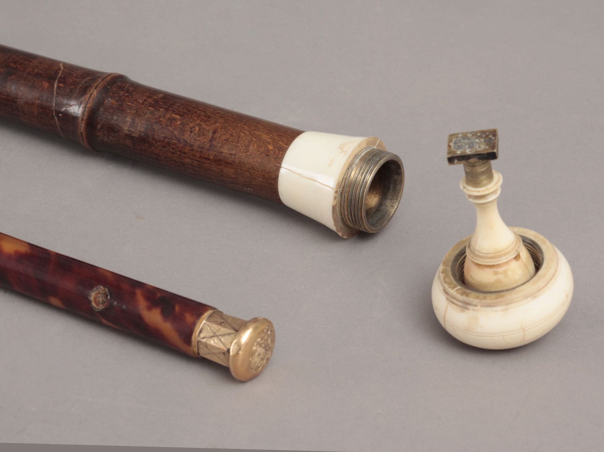 A 19th century bamboo and ivory walking cane