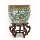 A 19th century Chinese cache-pot in Famille Rose porcelain