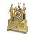 A 19th century French Empire period ormolu gilt bronze mantel clock