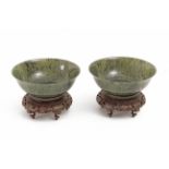 A pair of last third of 19th century-early20th century Chinese bowls in carved nephrite