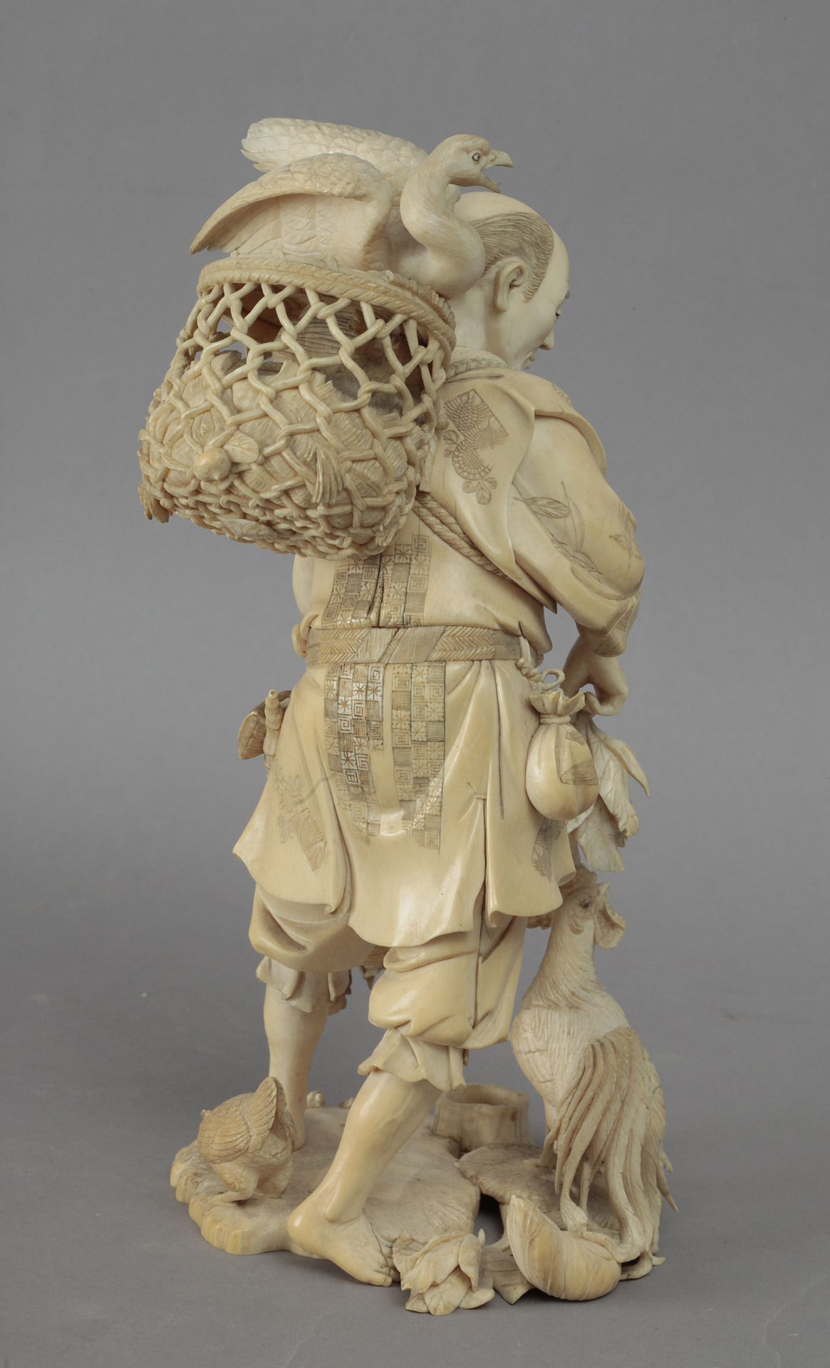 Late 19th century Japanese school. A carved ivory okimono depicting a farmer feeding birds. Signed - Image 5 of 8