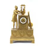 A 19th century French Empire period ormolu gilt bronze mantel clock