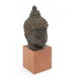 A Tibetan buddha head bronze sculpture. Chinese school from 18th century or earlier