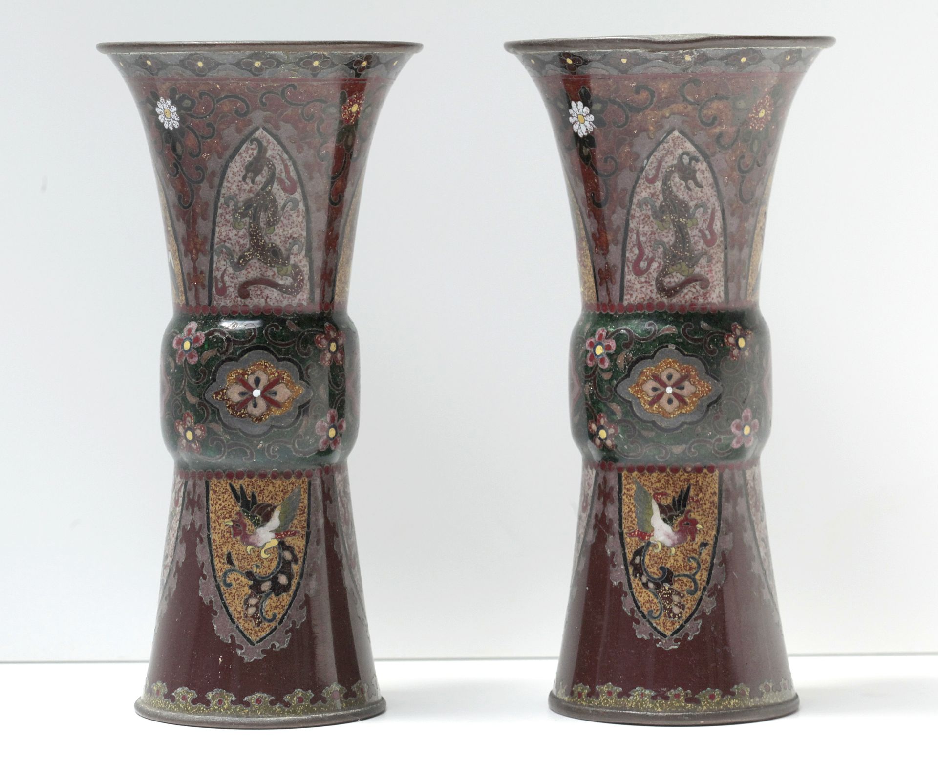 A pair of 19th century Chinese vases in copper and cloisonné enamel