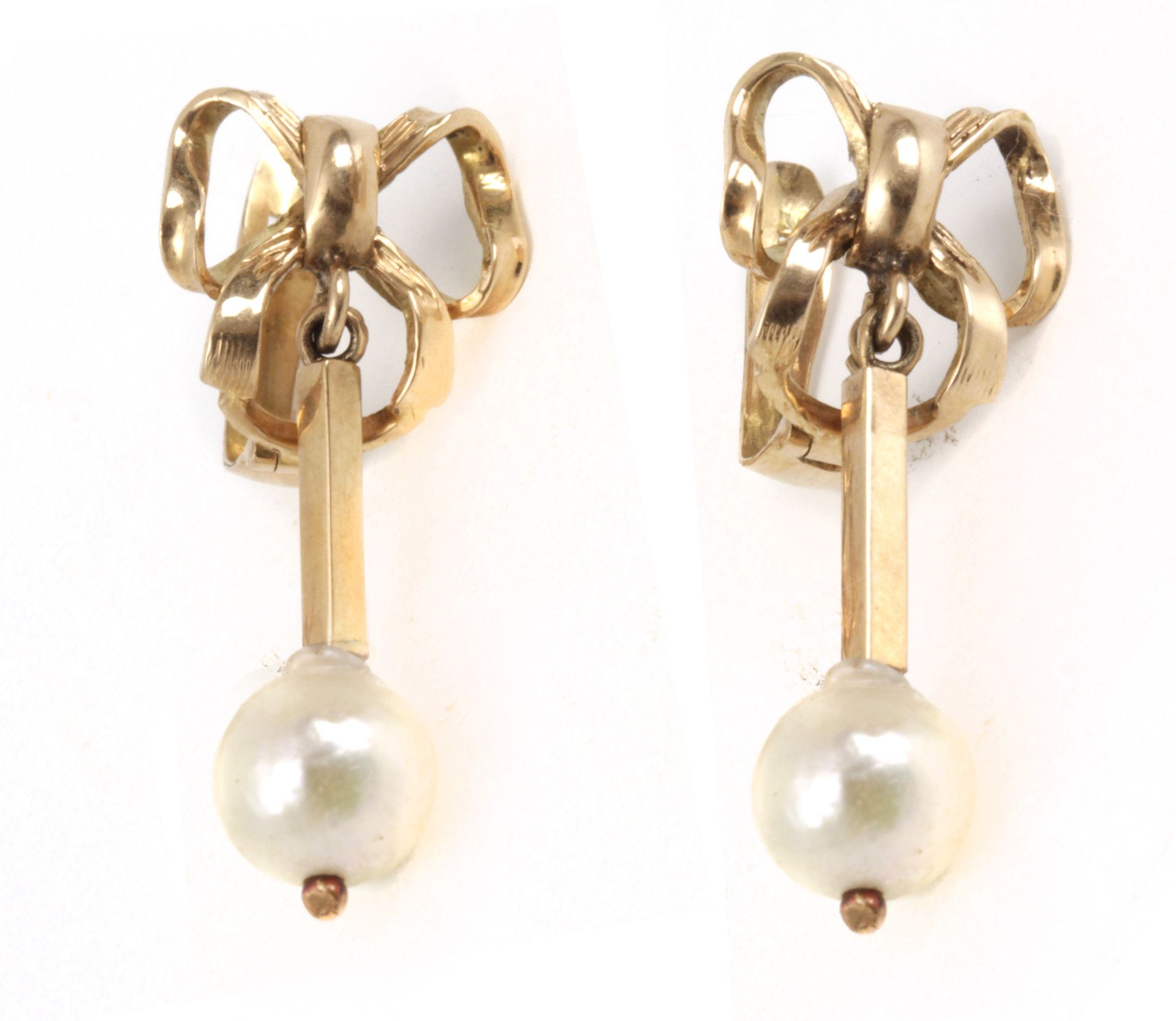 A pair of first half of 20th century Empire style earrings in gold and pearls