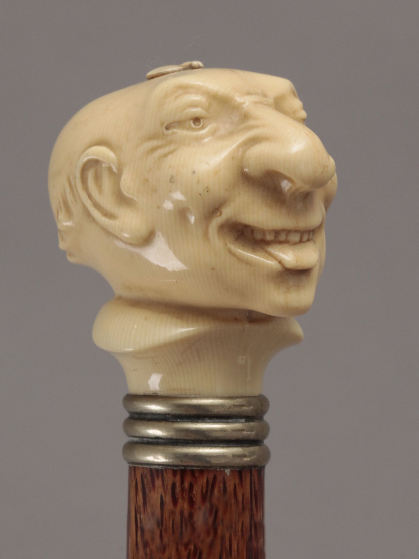 A 19th century fruit tree wood and carved ivory walking cane