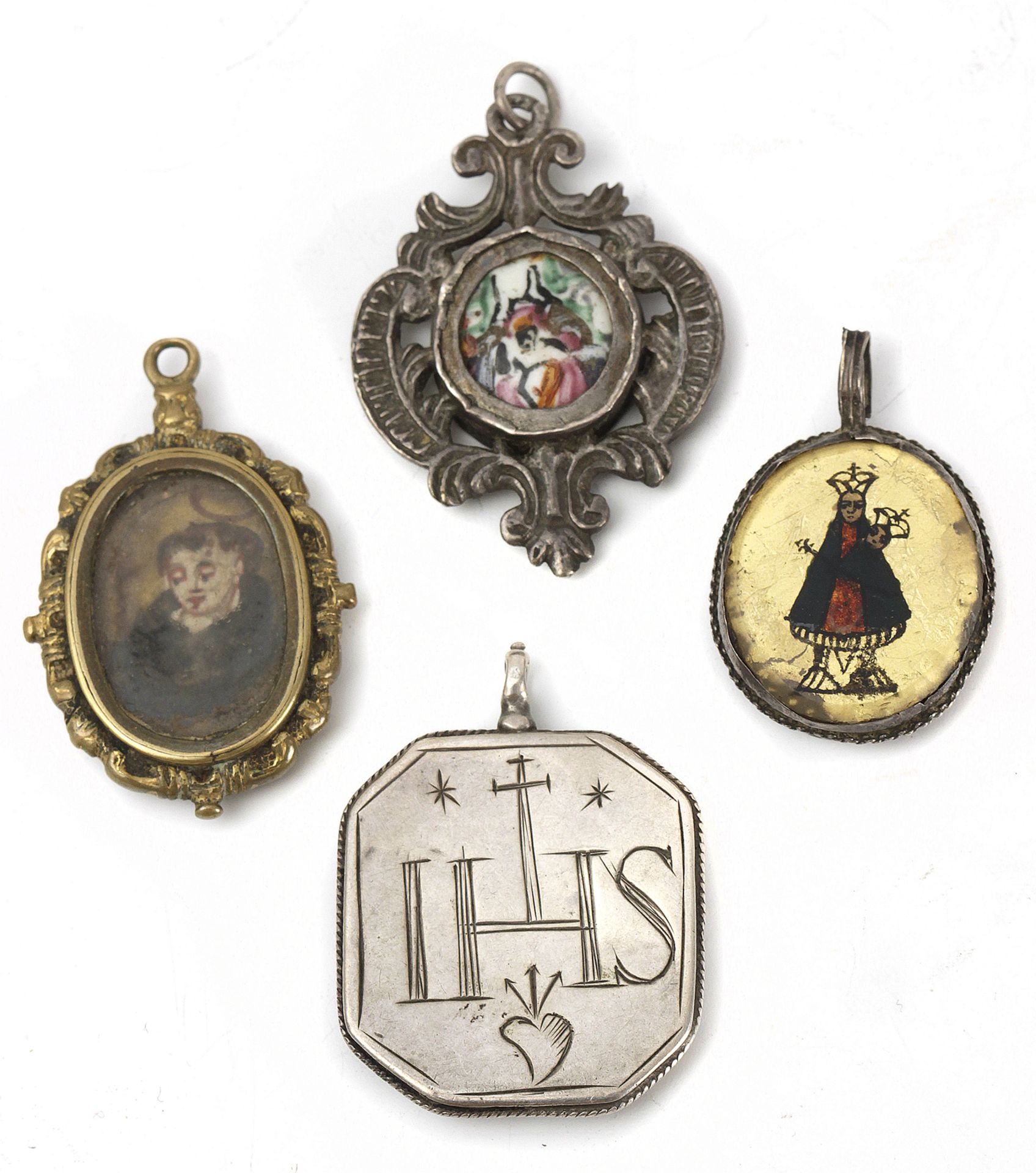 A collection of four silver reliquary pendants, 17th-18th centuries